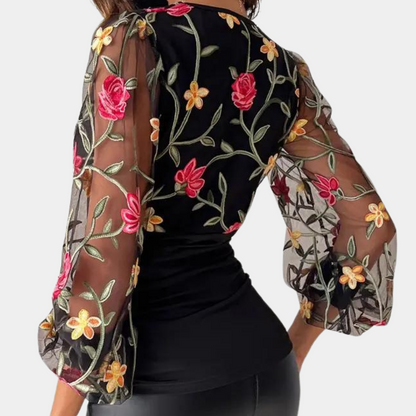 Elegant ladies top with floral embroidery