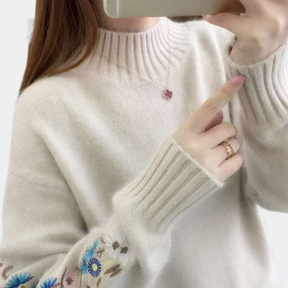 Thick women's sweater with floral embroidery